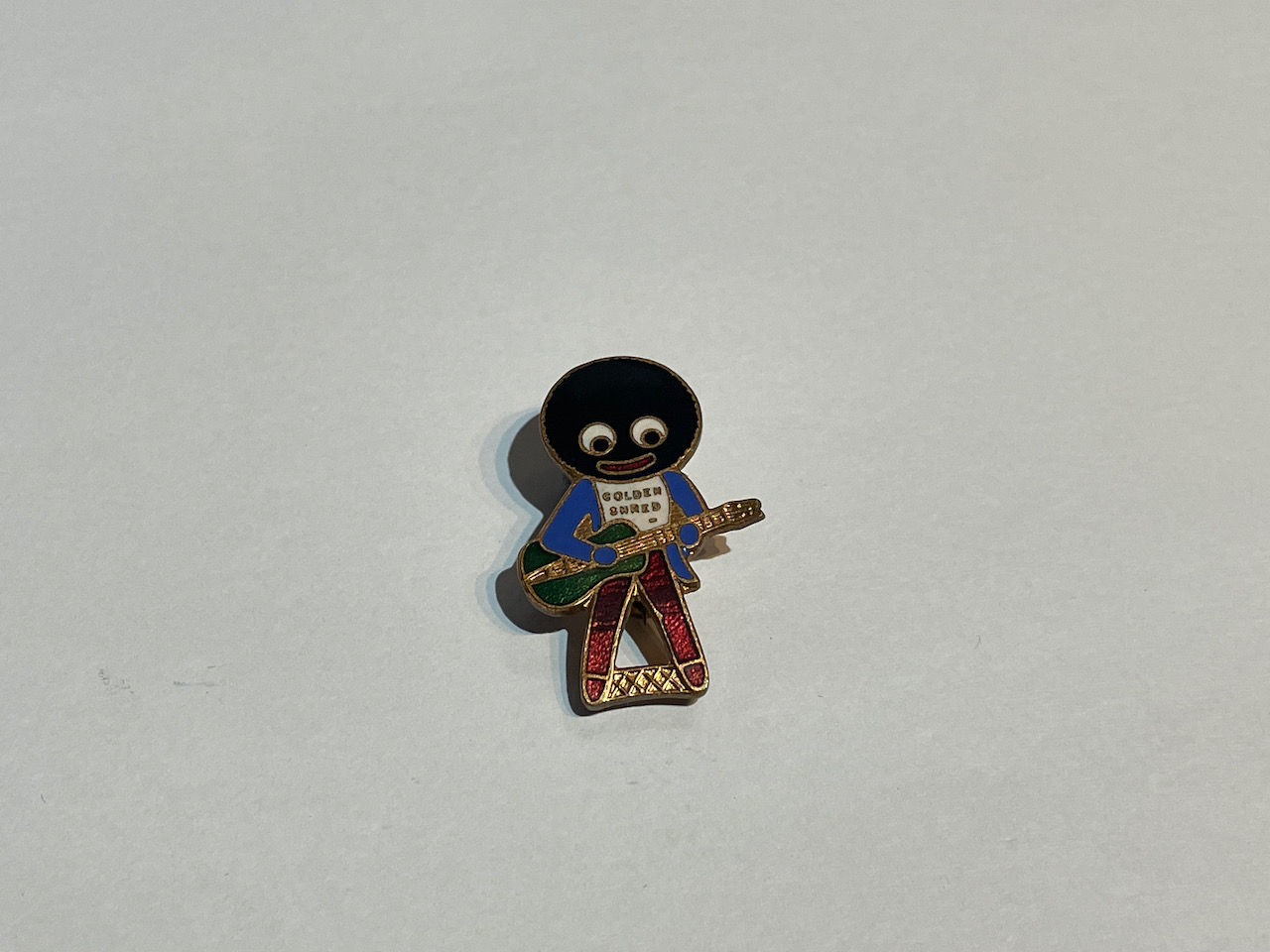 Vintage Robertson's Golly Guitarist Enamel Badge by Miller