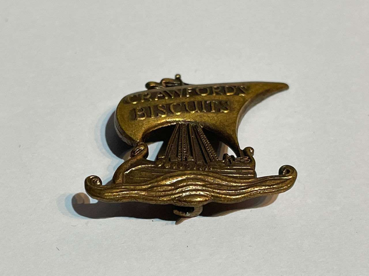Vintage Crawfords Biscuits Viking Ship Metal Badge