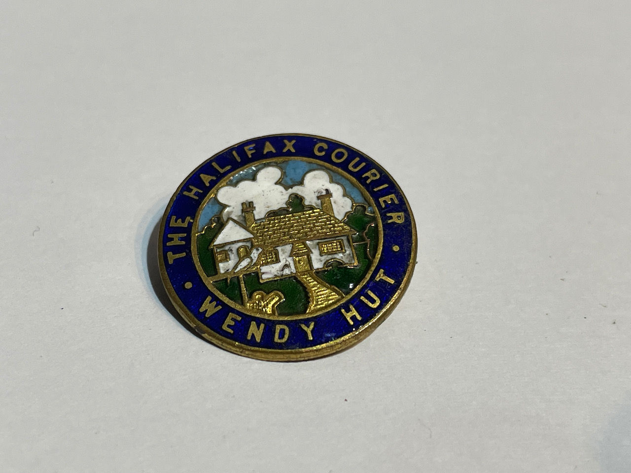 The Halifax Courier Wendy Hut Children's Club Enamel Badge
