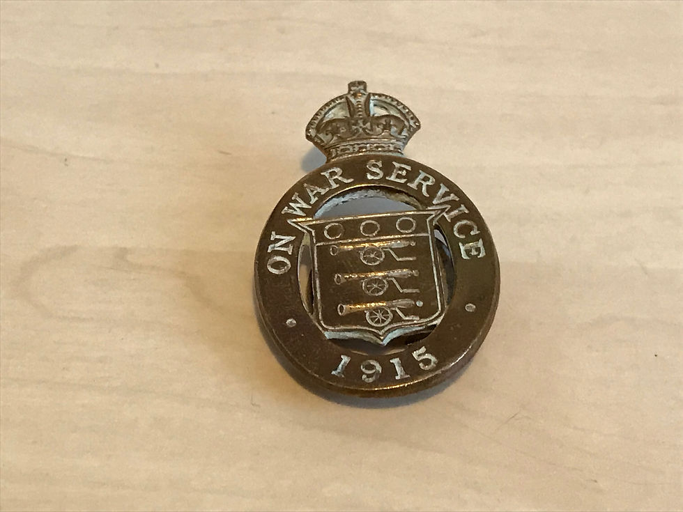 1915 On War Service Brass Badge