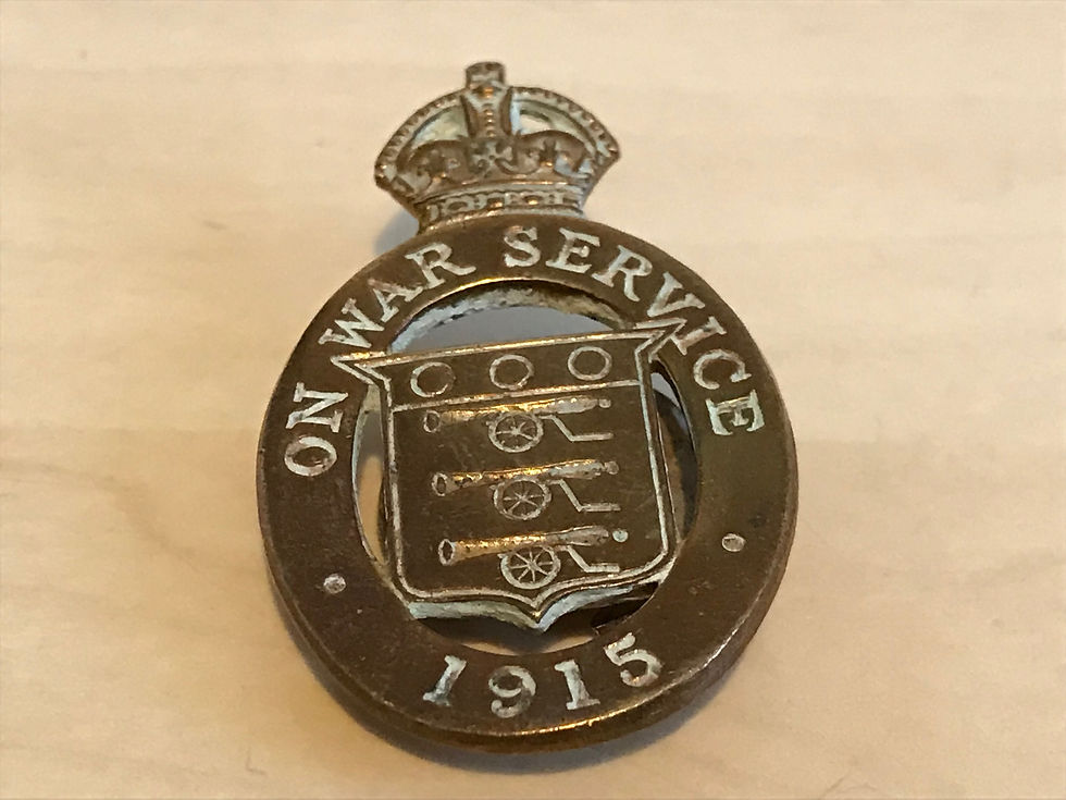 1915 On War Service Brass Badge Close Up