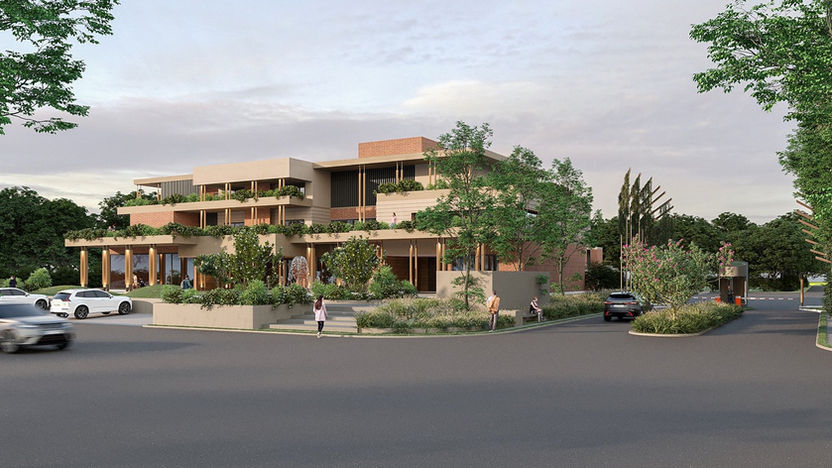 Modern building with cars and people on the street,