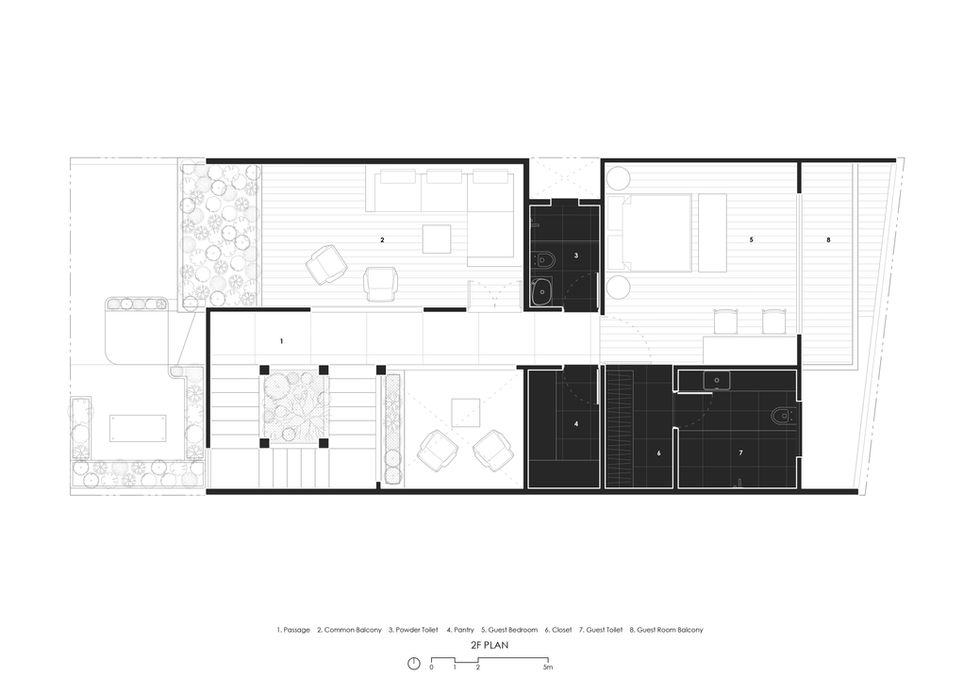 Floor plan with furniture and text details, showing the entire building layout.