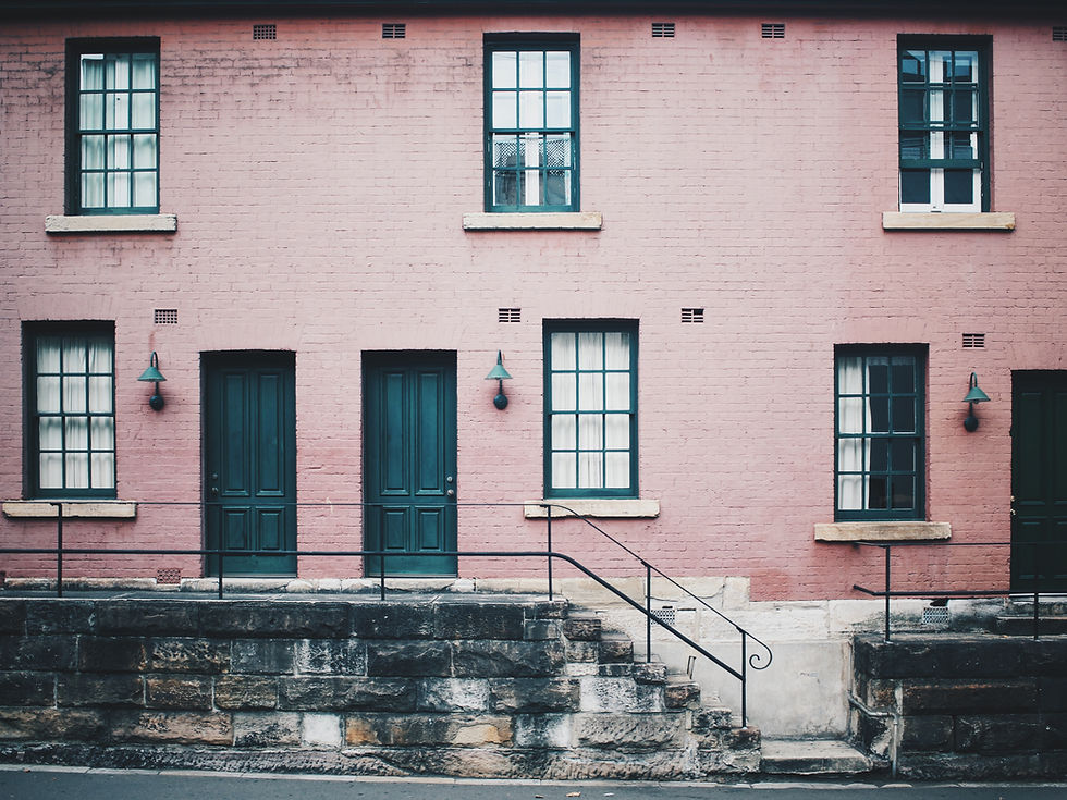 photo of multi family building House hacking a multifamily building
