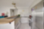 A discreet open-plan kitchen