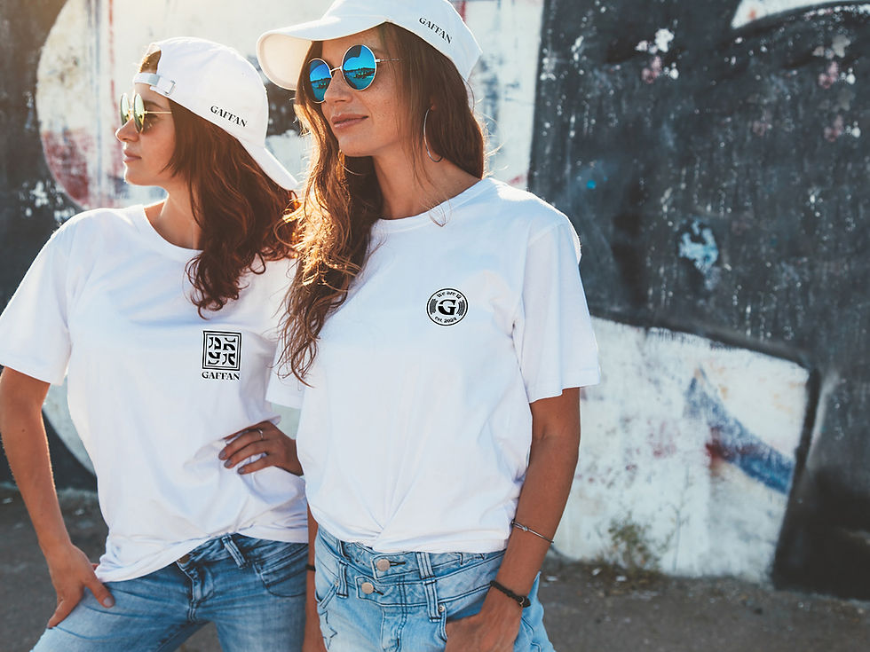This image, found on the homepage of the GAFFAN website, is related to the headline 'The embodiment of 12th player style' and shows two women wearing their GAFFAN Label reto casual t-shirts. GAFFAN is a soccer clothing brand that designs and sells men's and women's casual and soccer t-shirts with shipping available to all the USA and Canada.