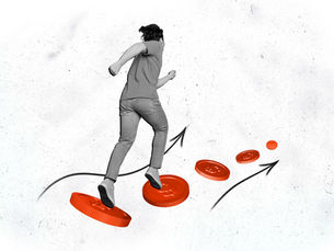 Person in grayscale runs on oversized red coins with upward arrows on a textured white background. Header image related to the blog post "Why brand consistency is important"