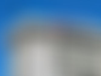 Tall hotel building under clear blue sky with "Marriott" logo in red on top. Modern architecture, windows, and "Marriott Bonvoy" text visible. Header image related to the case study "Storytelling for the global hotel brand Marriott"