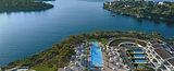Hero image of Peregryn case studies page, showing Ikos Porto Petro representing our travel website content creation