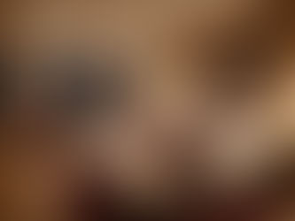 Cozy bedroom with a person lounging on a bed. Header image related to the blog post: "The five senses of success: Why sensory hotel design offers you a strategic edge"