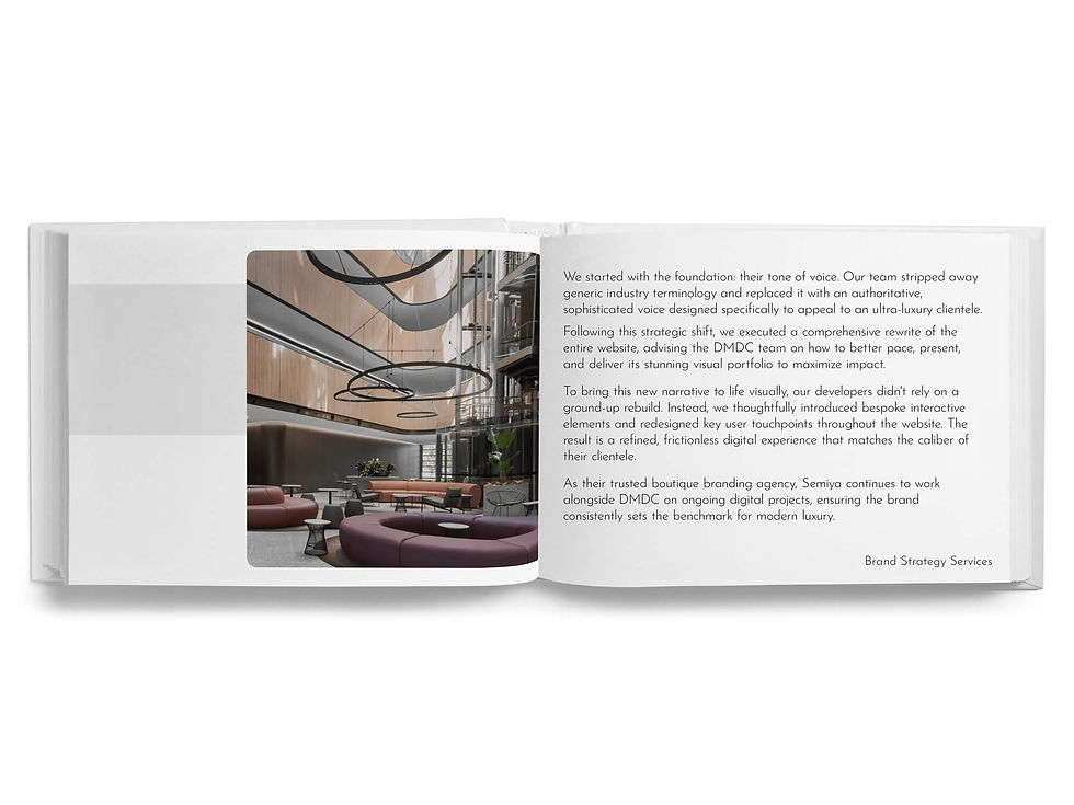 Open book spread showing a luxury lobby photo on the left and brand strategy text on the right, ending with Brand Strategy Services.