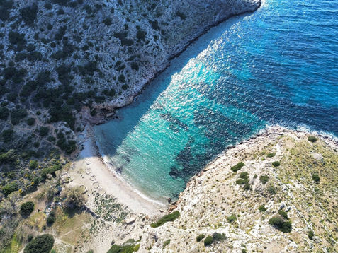 Header image of a beautiful greek beach, related to the blog post "Forget Mykonos. These Are The Secret Marvels of the Cyclades"