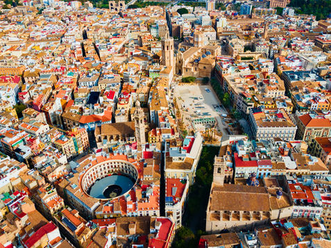 Header image of an aerial view of a Valencia cityscape, related to the blog post "The Spanish beach city that's becoming a big hit: Love Barcelona? Then you need to head to Valencia"