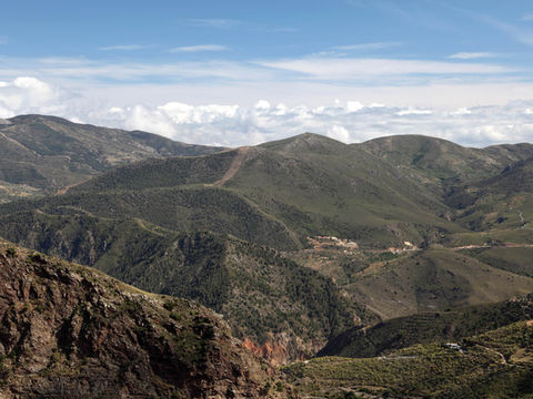 Header image of the Alpujarras mountains related to the blog post: "Unveiling the soul of the Alpujarras: Spain adventure travel"