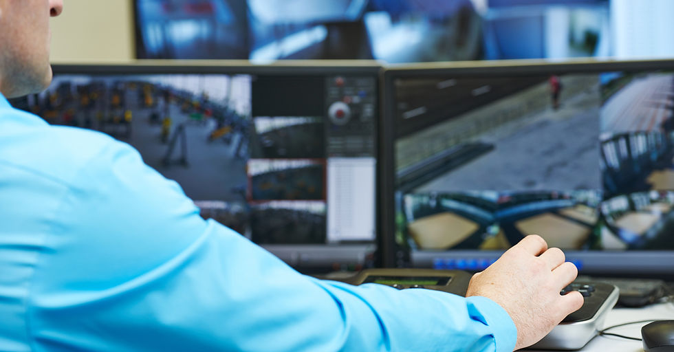 CCTV operator hand images on monitor