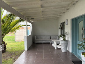 A Spacious Coastal Home with Flexible Living and Flatlets Just Moments from the Beach