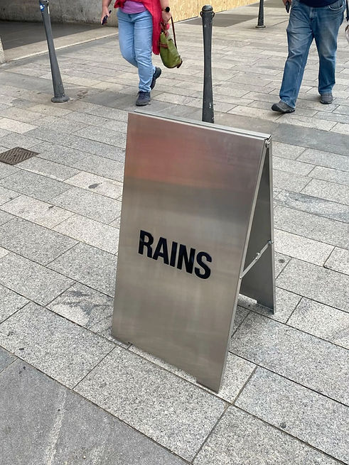 Pavement sign at walking space