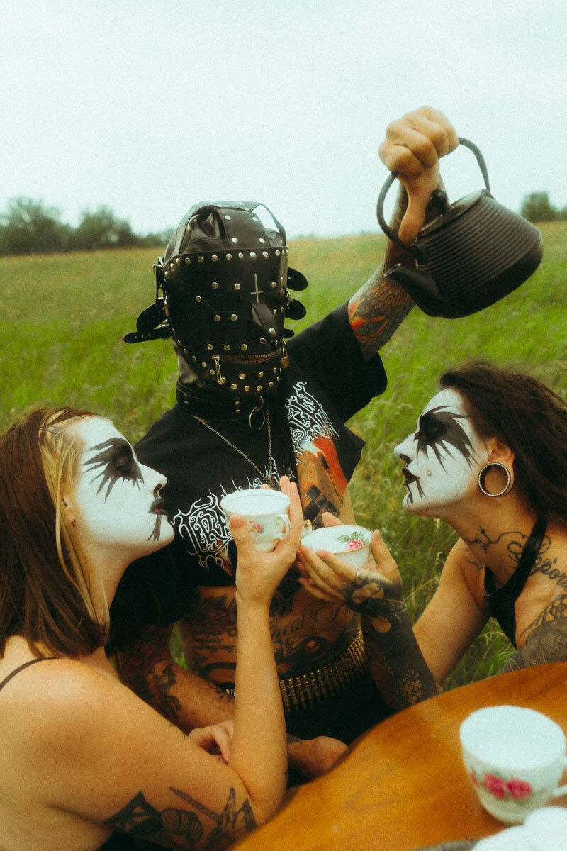 Hard-rock, "KISS"-painted-faces tea-drinkers.