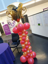 Red & Gold Mini Balloon Columns With Trophy Cup Toppers
