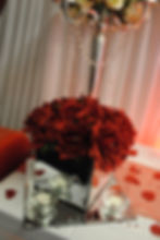 With Artificial Red Roses