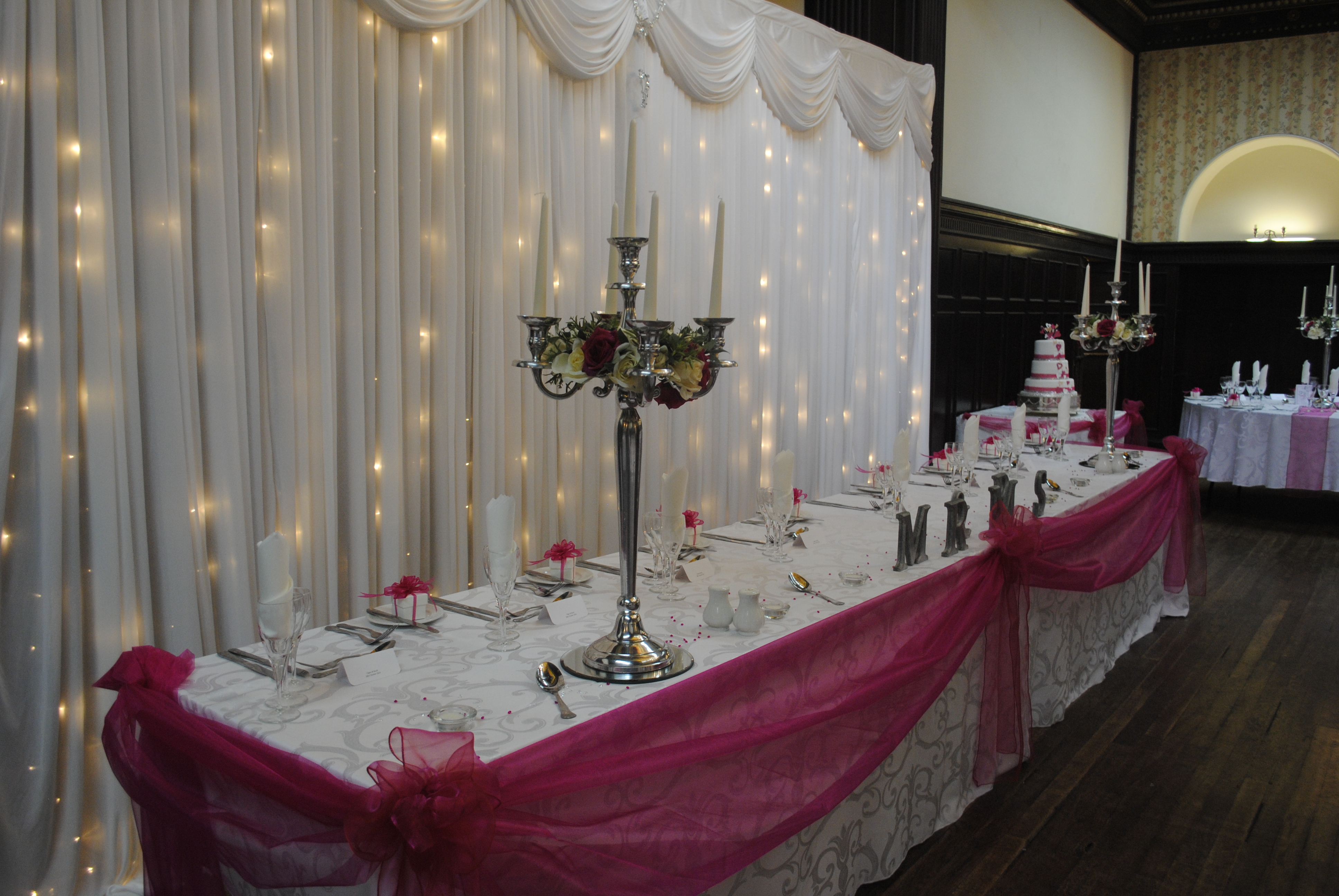Candelabra with cream rose rings