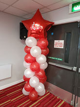 Red & White Large Balloon Columns With Red Star Topper & Branded Company Logo