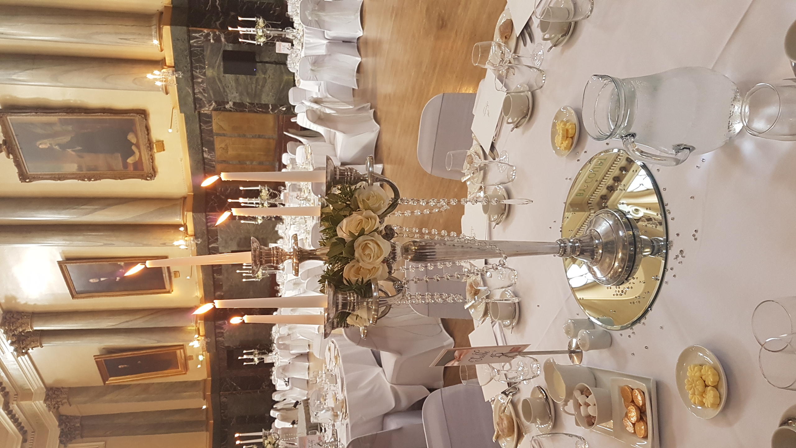 Candelabra with cream rose rings