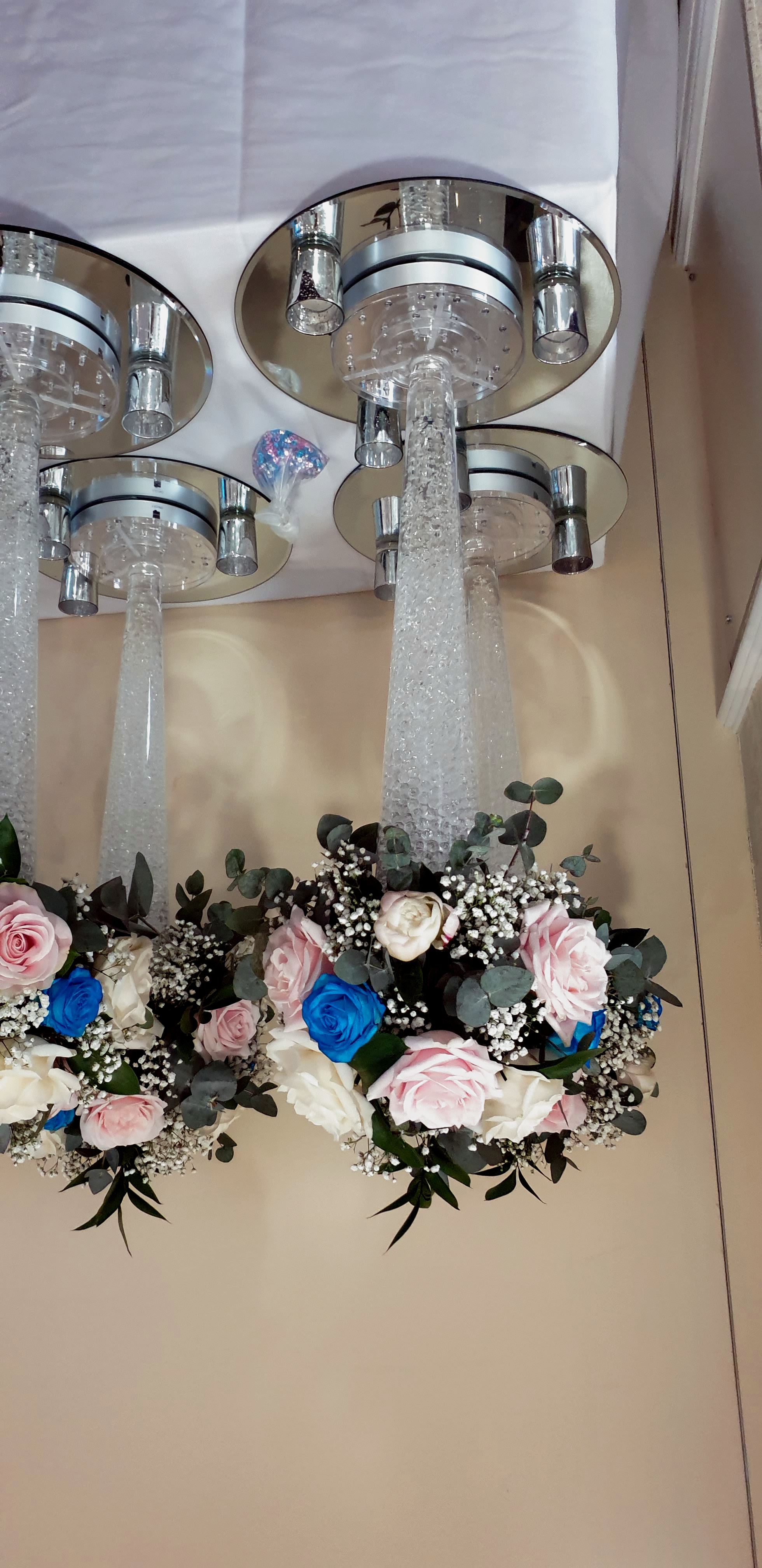 With Fresh Blue, Pink & Ivory Flowers.