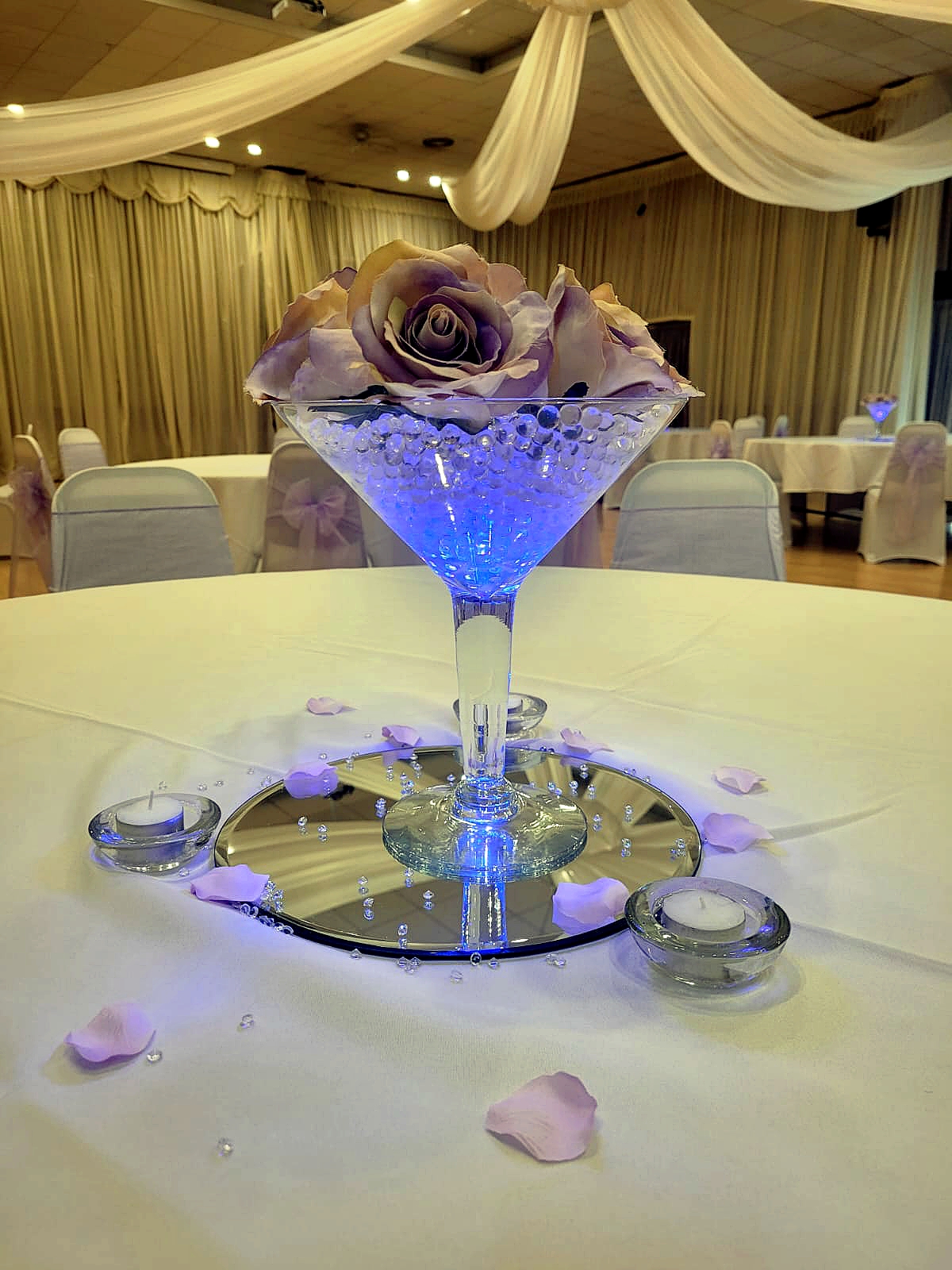 With Artificial Lilac Roses.