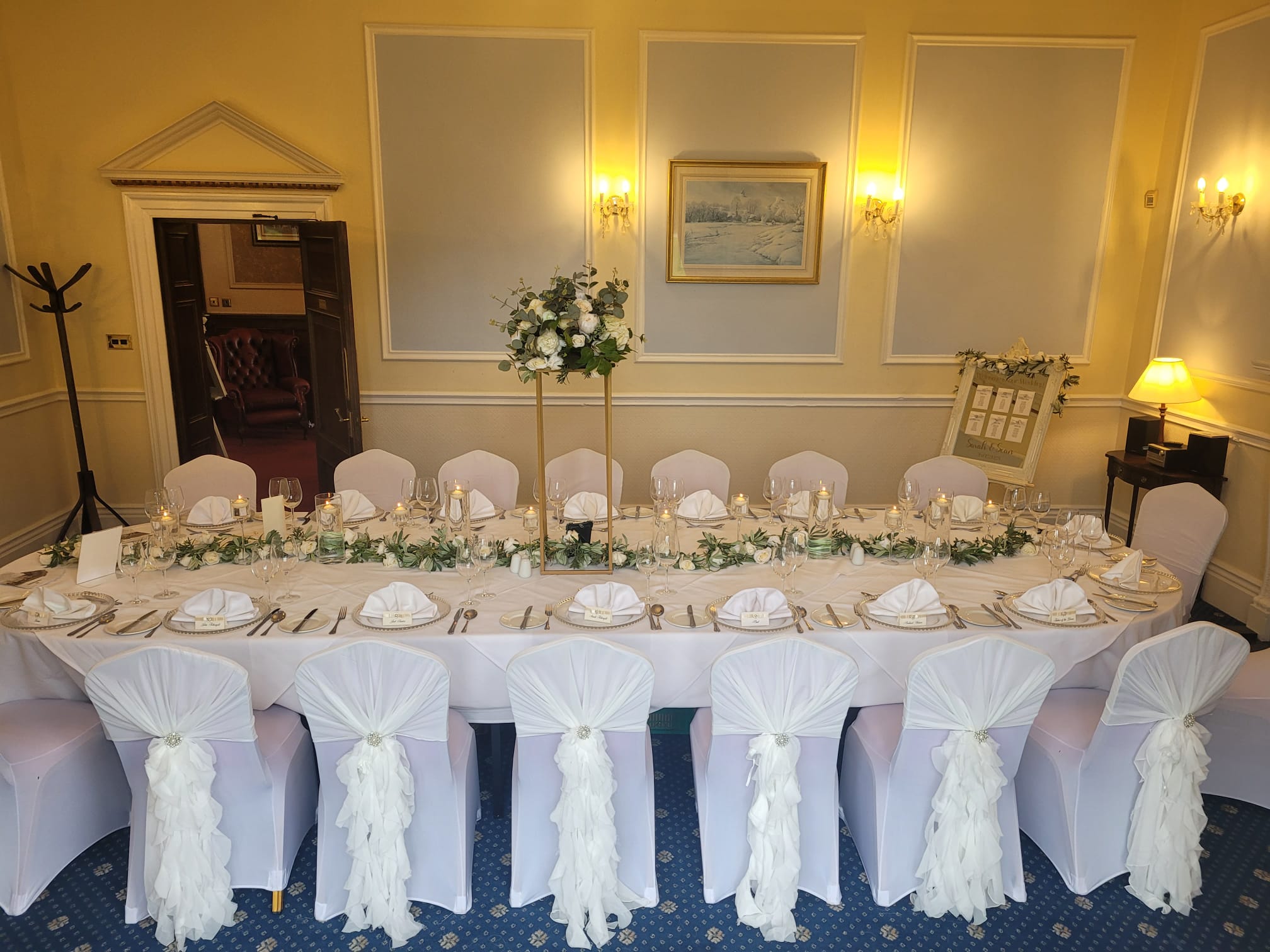 Geometric Stands With Artificial Cream Rose Garlands 