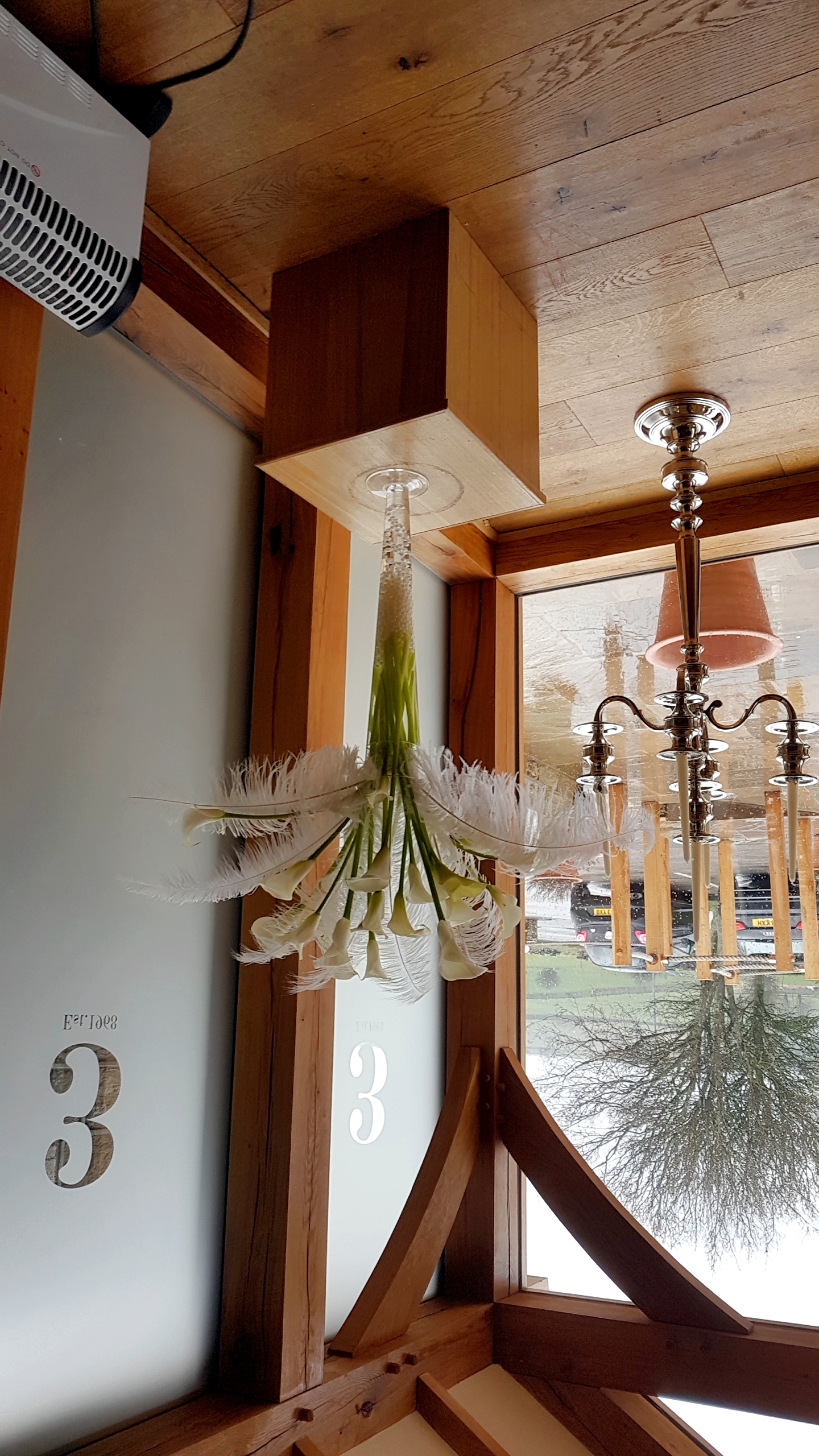 With Fresh Calla Lily & Ostrich Feathers.