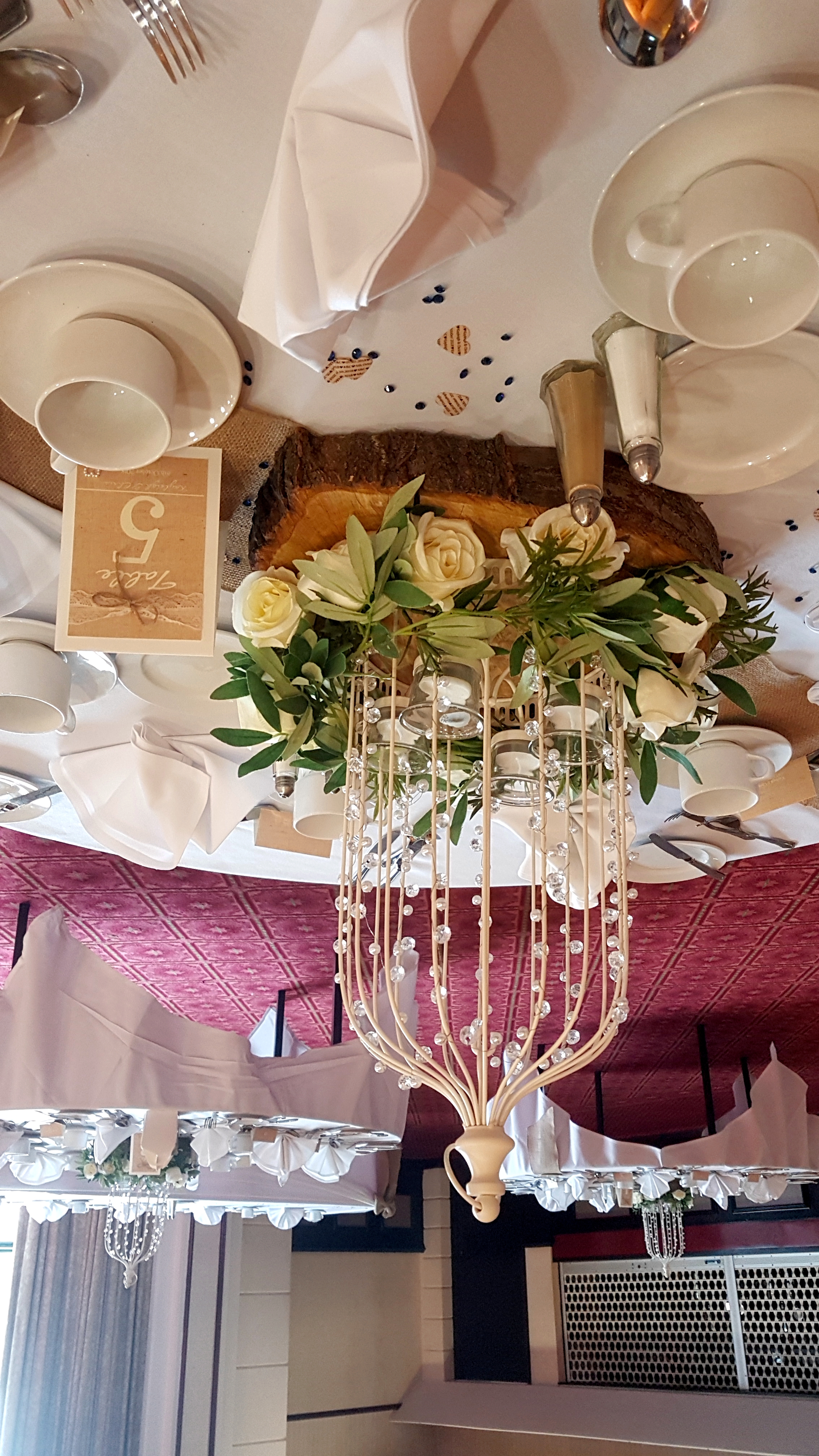 With Artificial Cream Rose Garlands