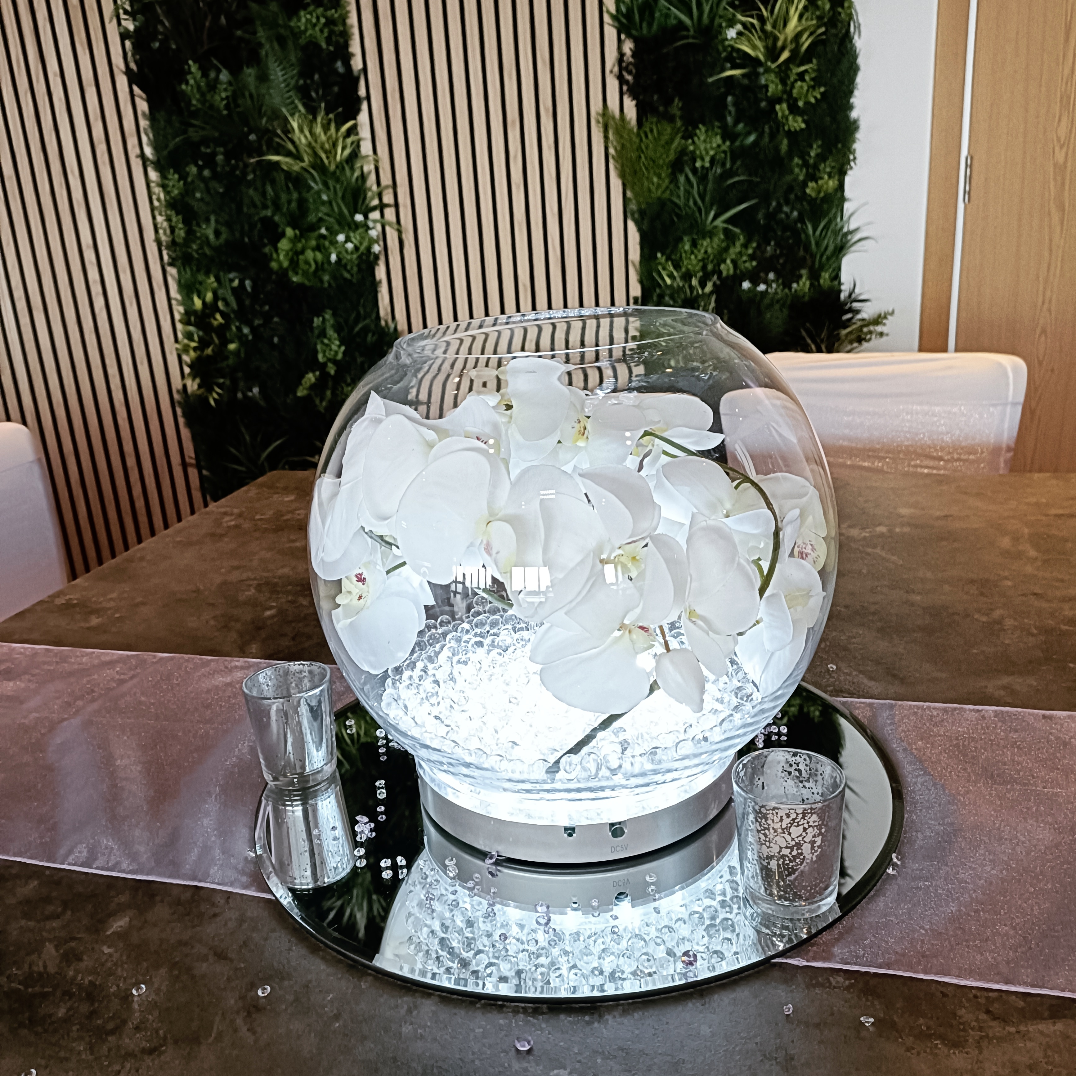 With Artificial White Orchids