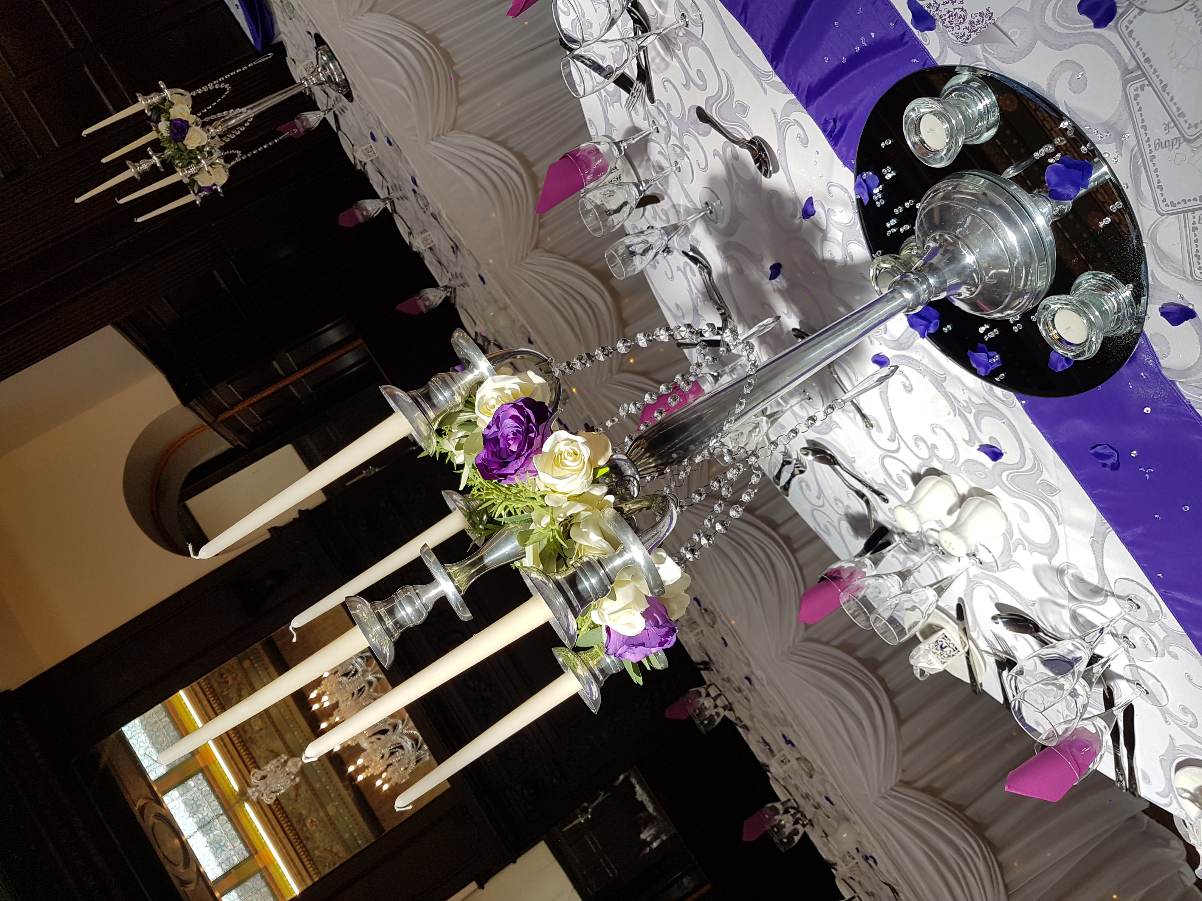 Candelabra with cream rose rings