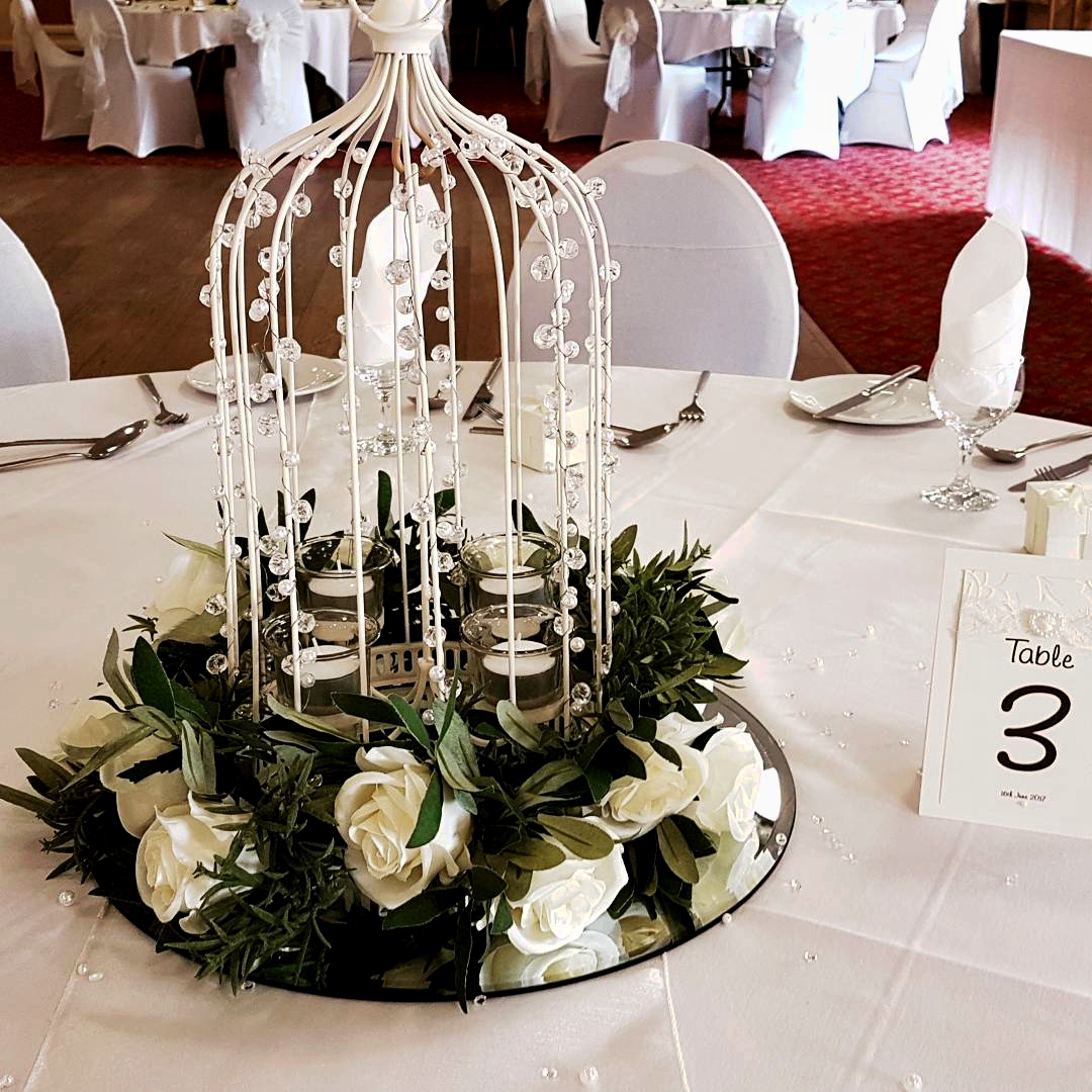 With Artificial Cream Rose Garlands