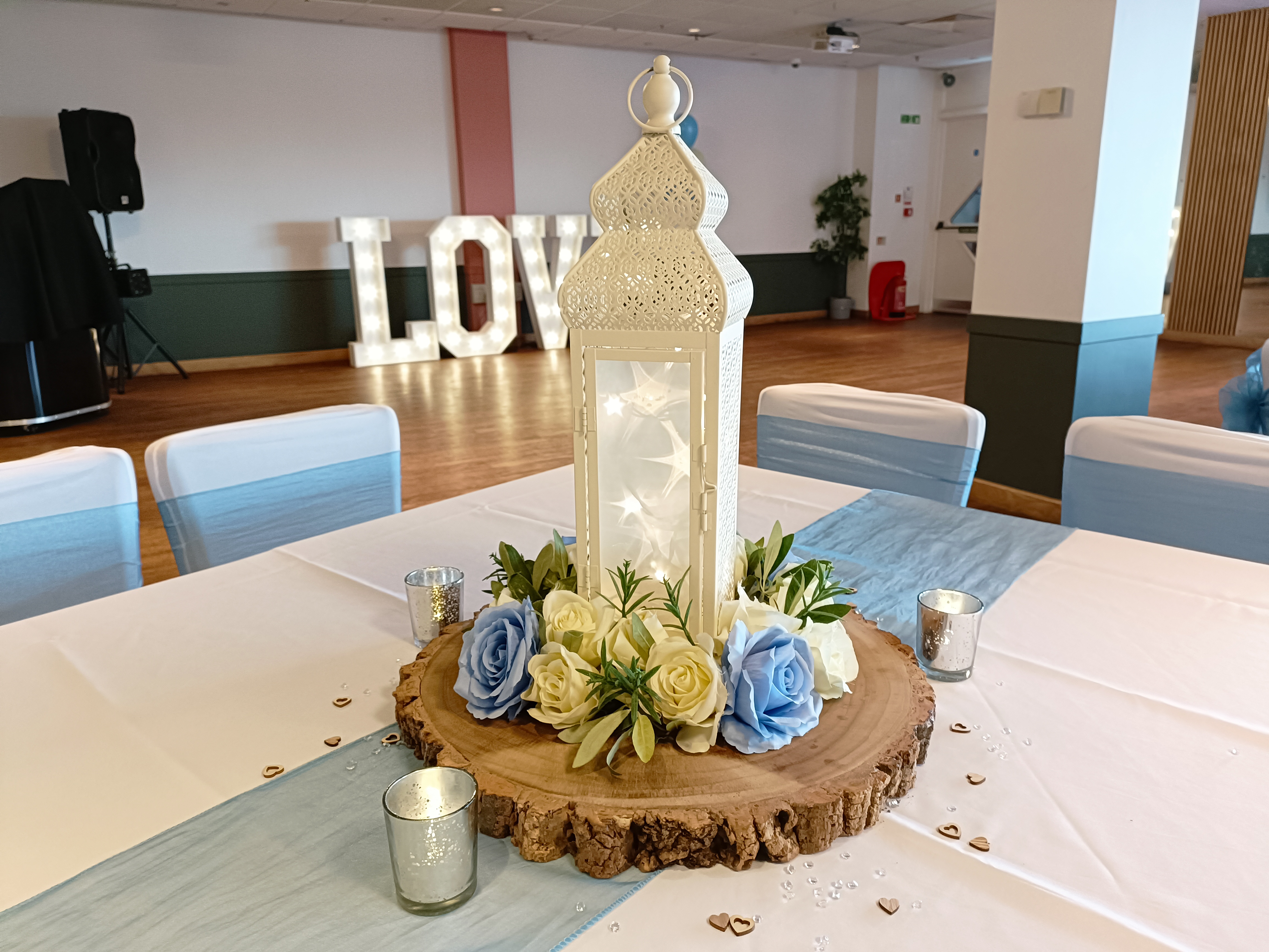 With Artificial Cream & Blue Rose Wreaths