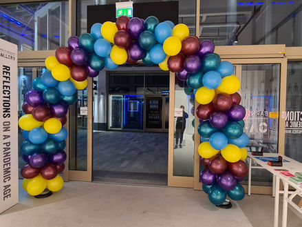 Spiral Arch Green, Yellow, Burgundy, Blue & Purple