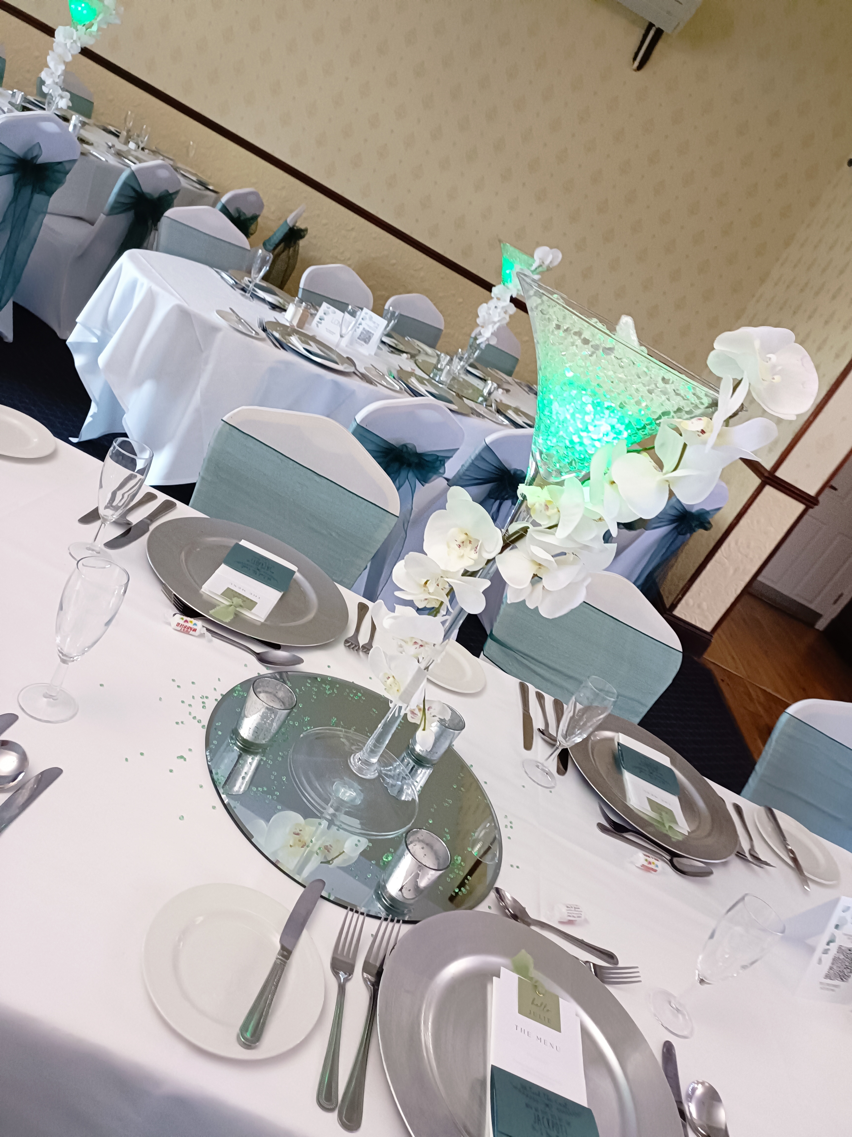 With Green Light & White Orchids