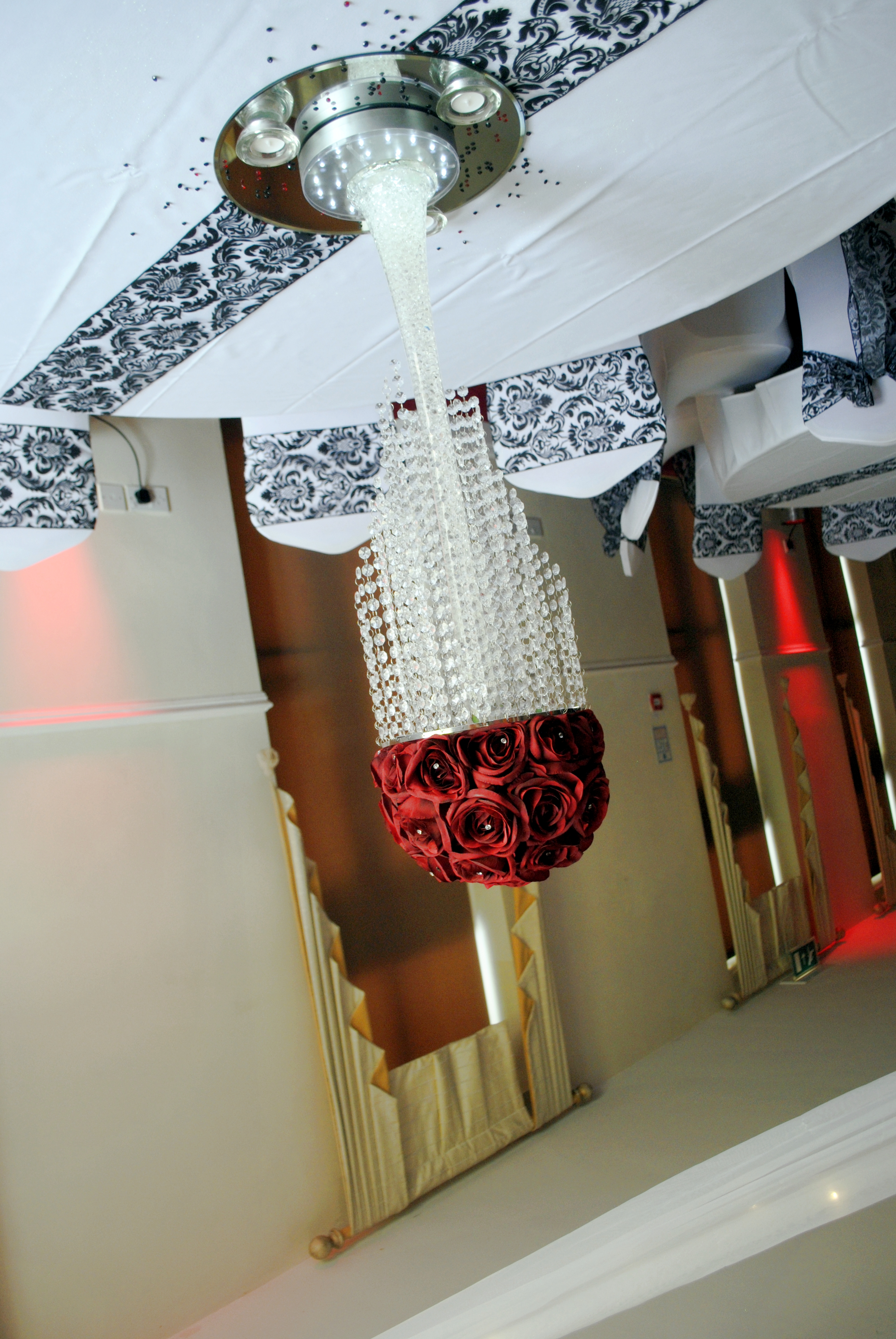 With Artificial Red Rose Dome