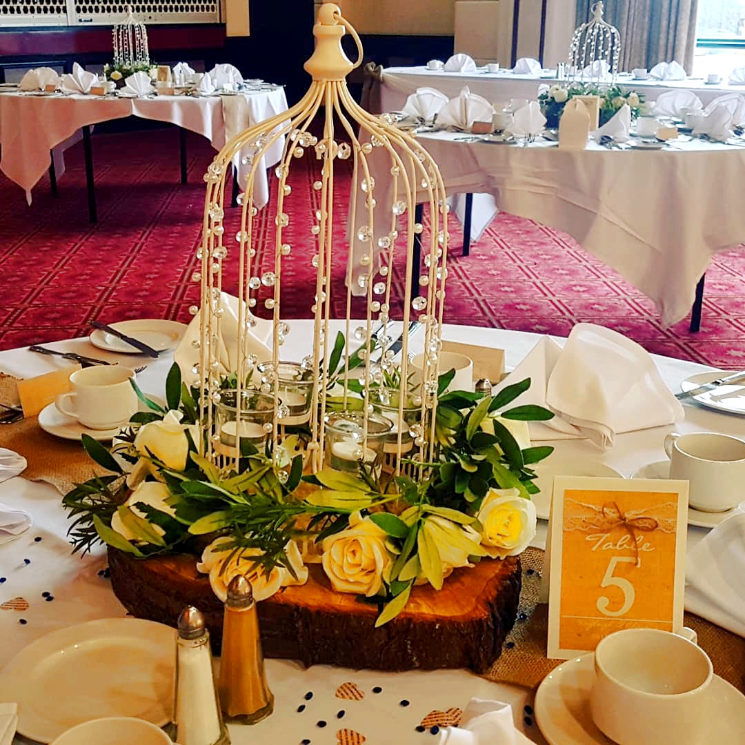 With Artificial Cream Rose Garlands