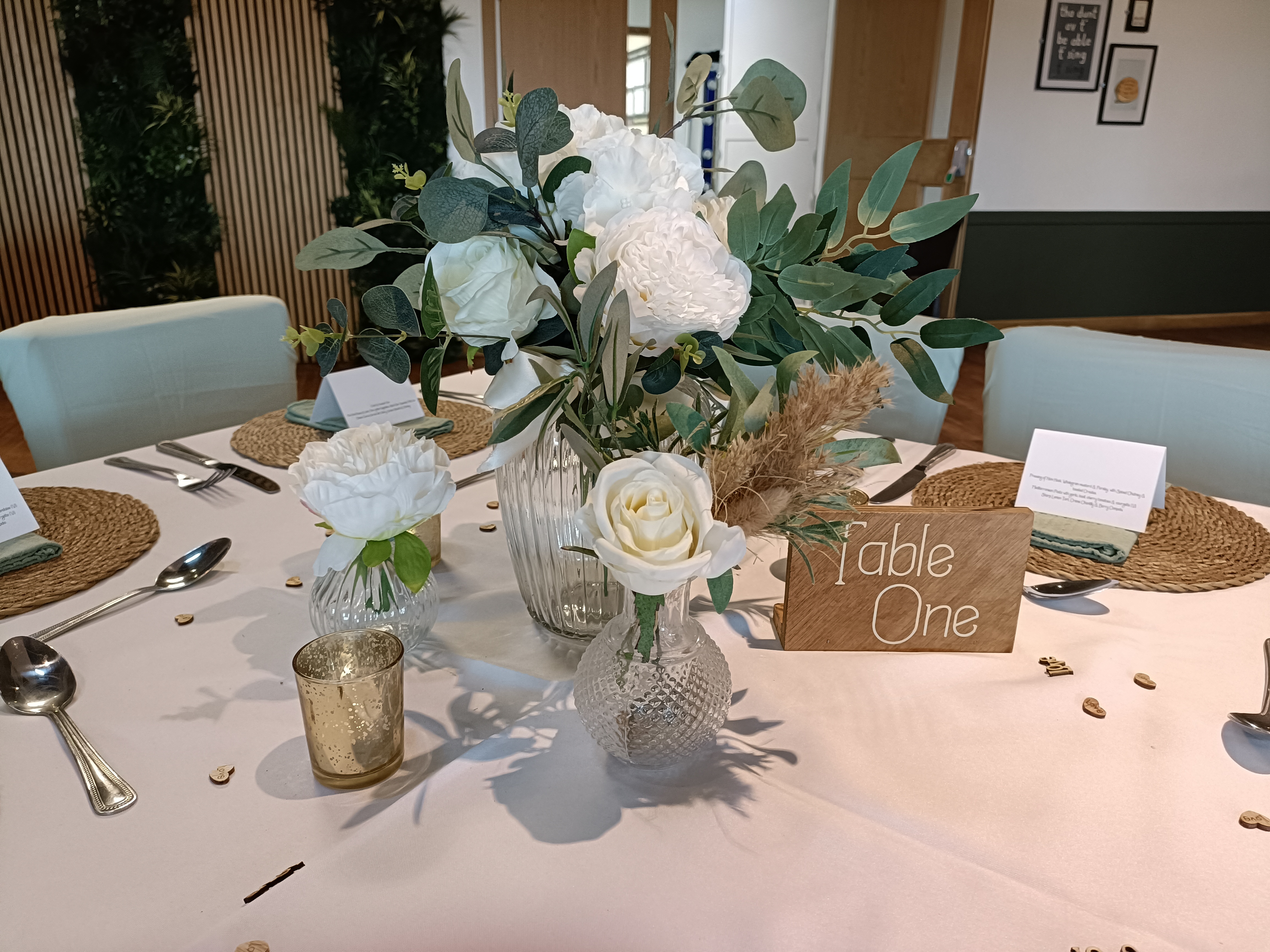 Trio with a 2x bunches of artificial flowers