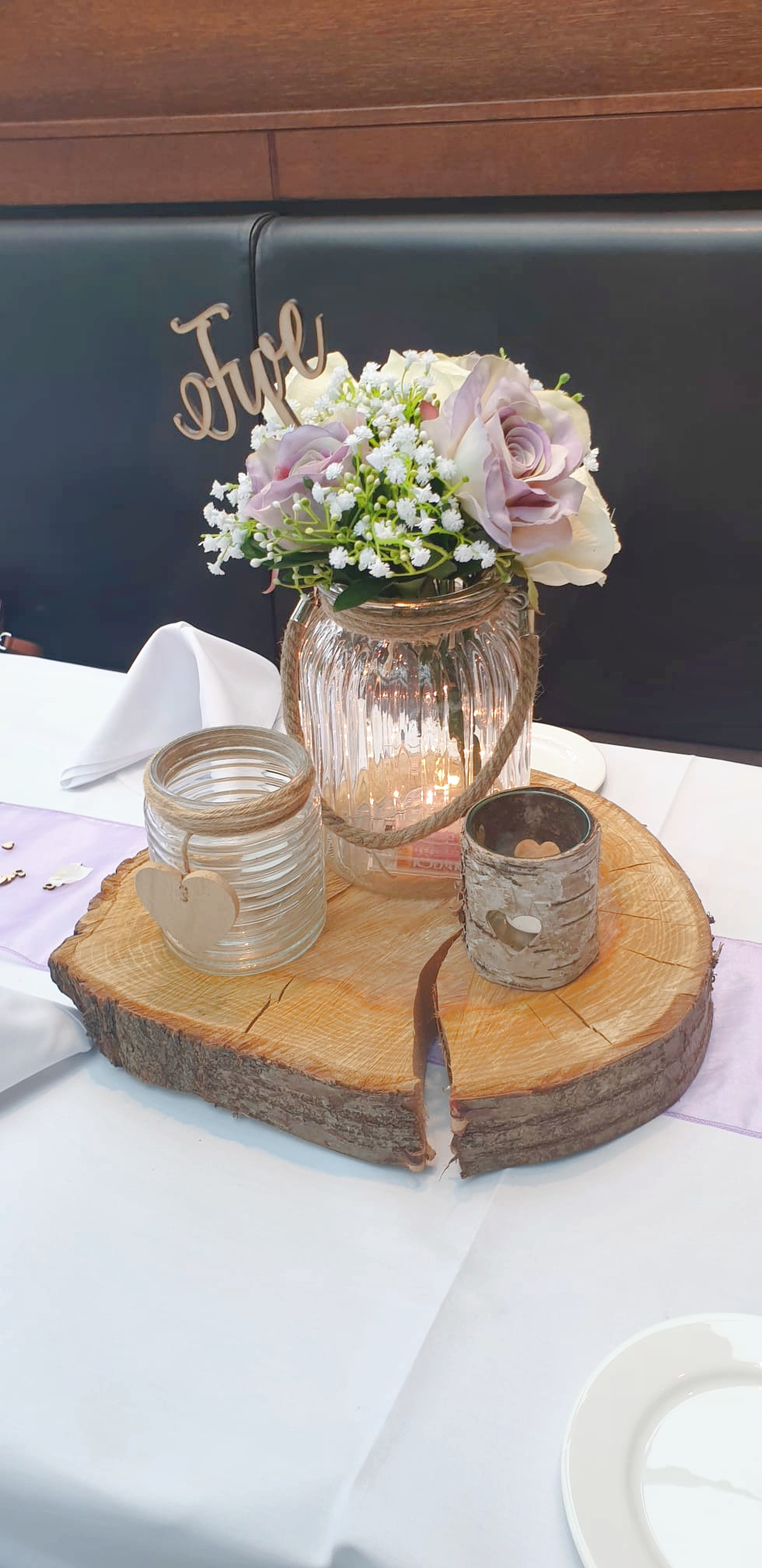 With Artificial Gyp & Lilac Roses.