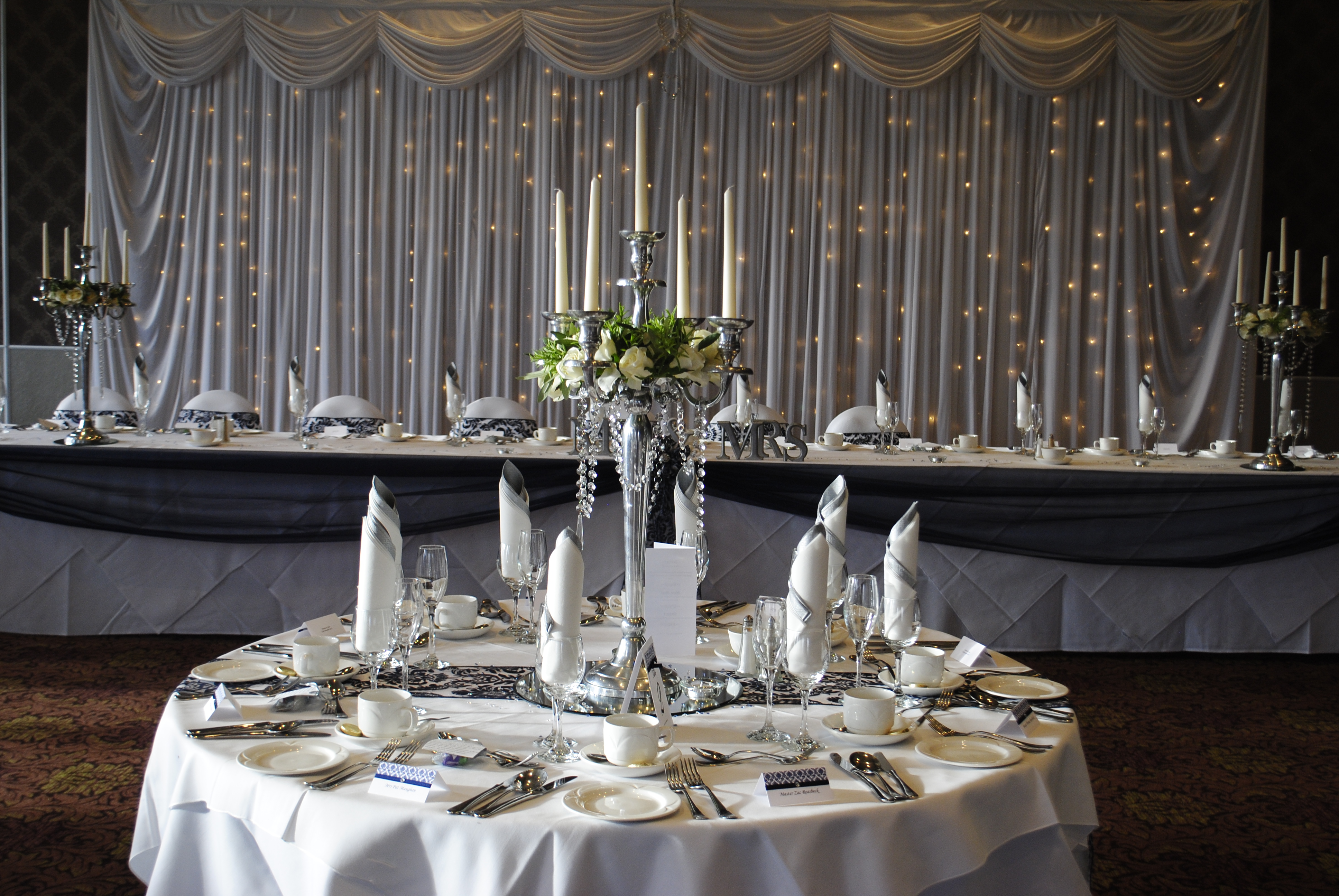 Candelabra with cream rose rings