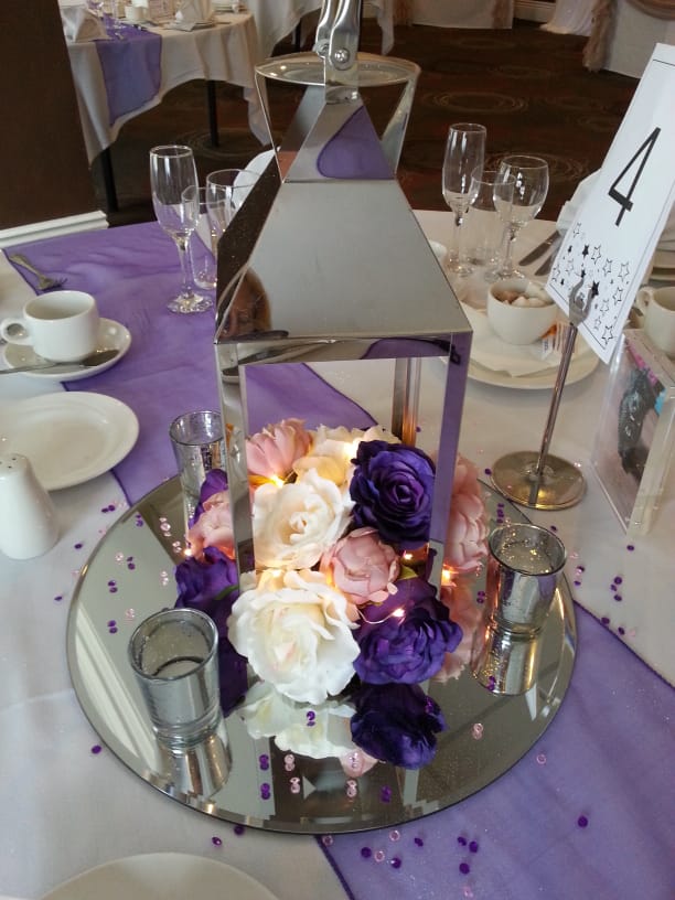 With Cream, & Blush & Purple Rose Arrangements