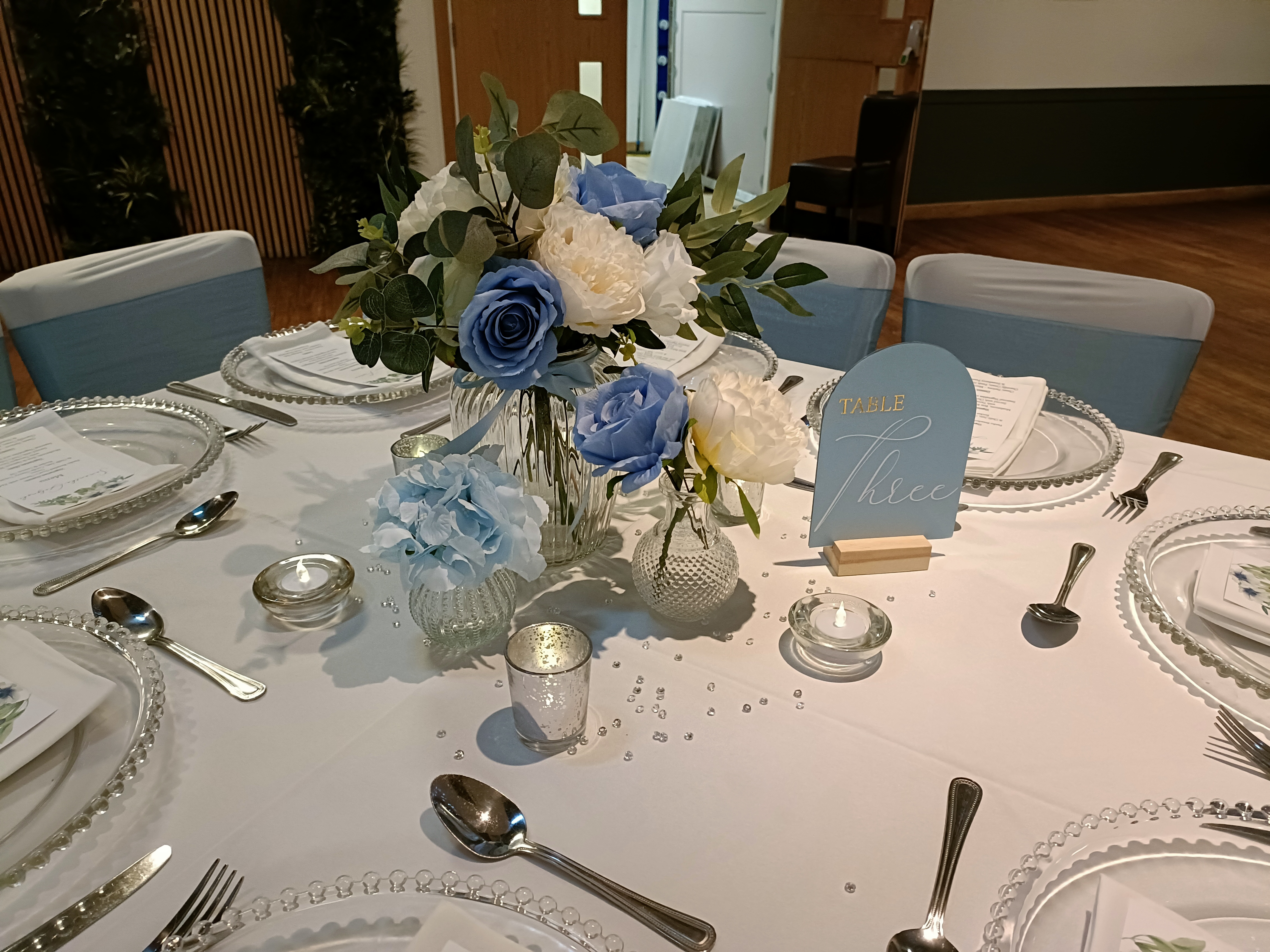 Trio with a 2x bunches of artificial flowers