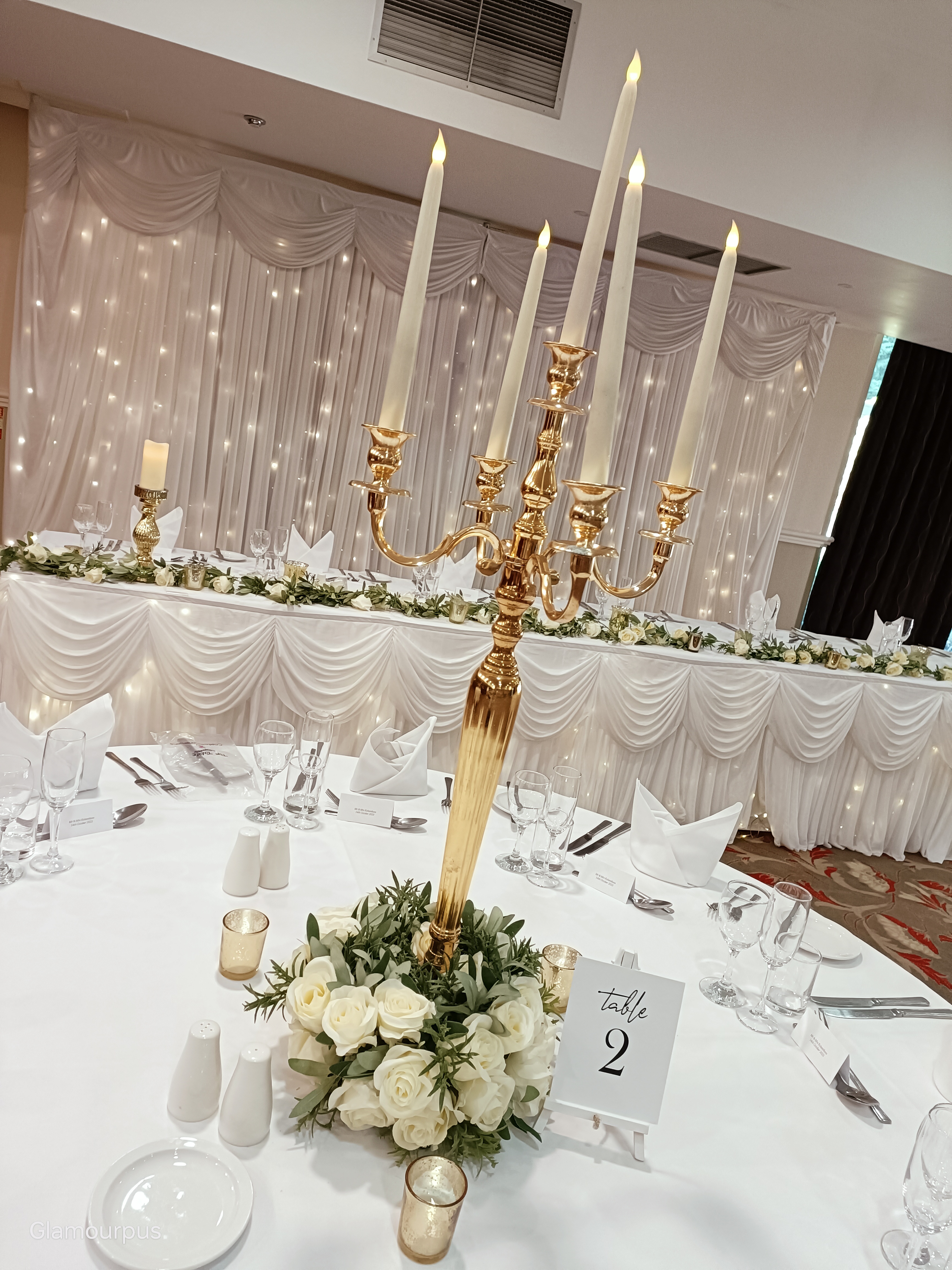 With Artificial Cream Rose Wreaths around base