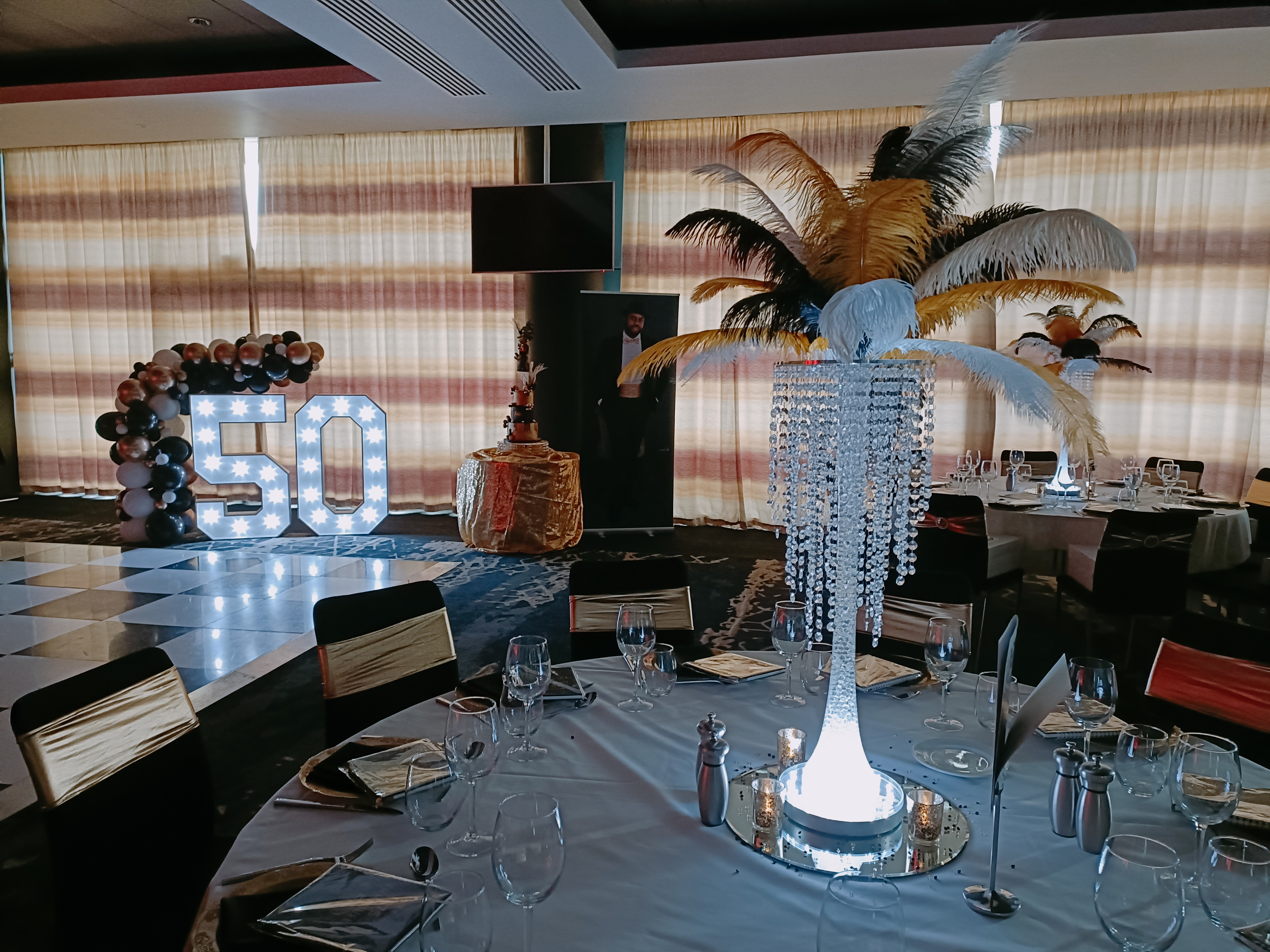 White, Black & Gold Ostrich Feather Centrepiece