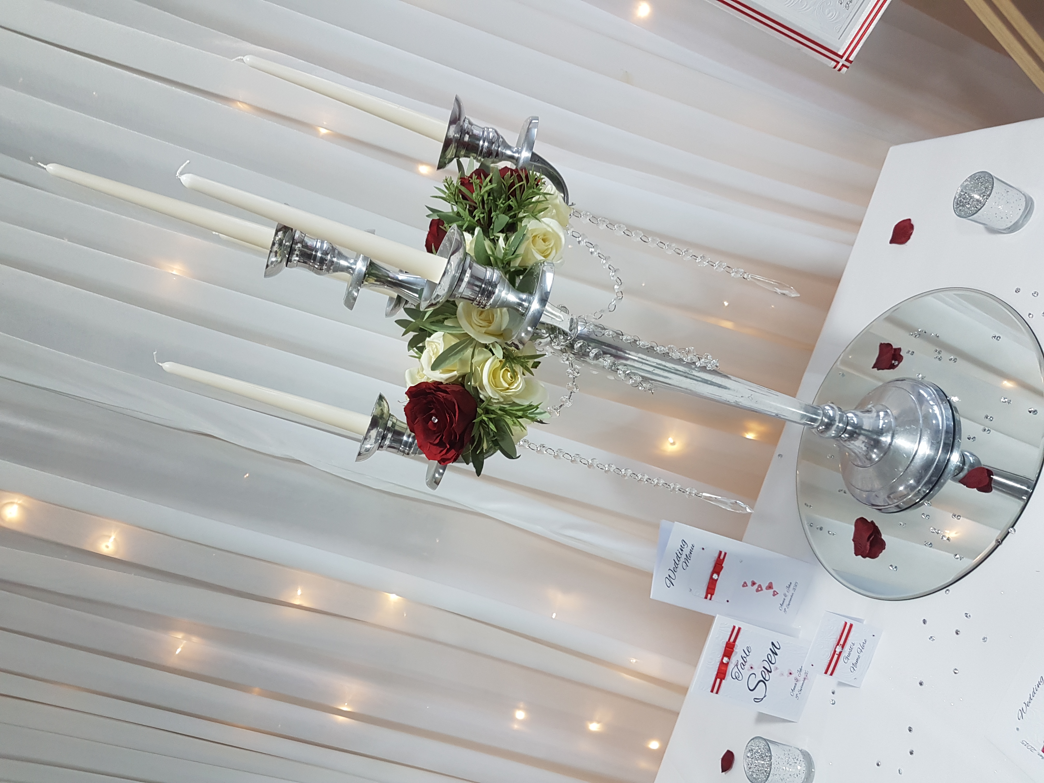 Candelabra with cream rose rings