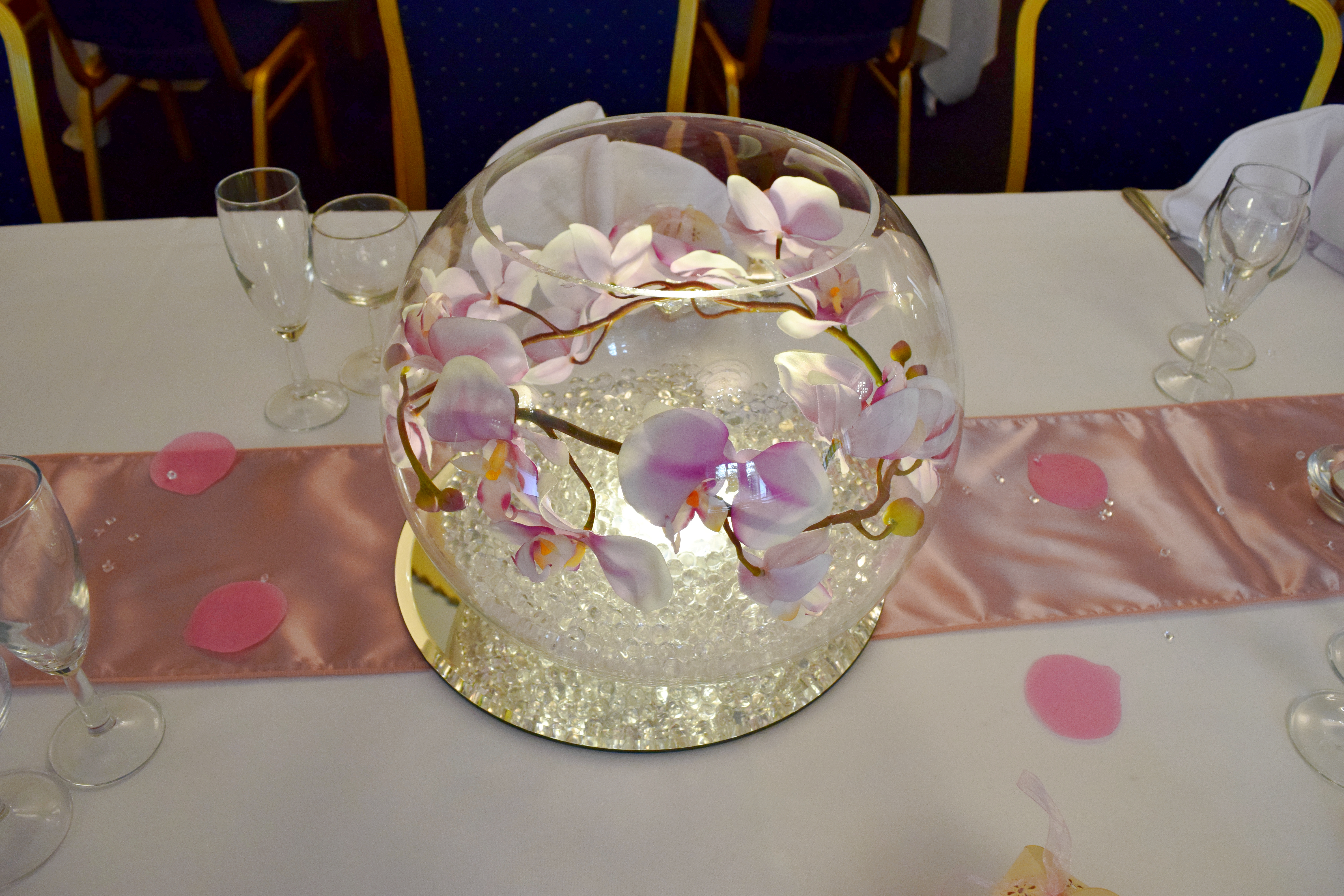 With Artificial Baby Pink Orchids