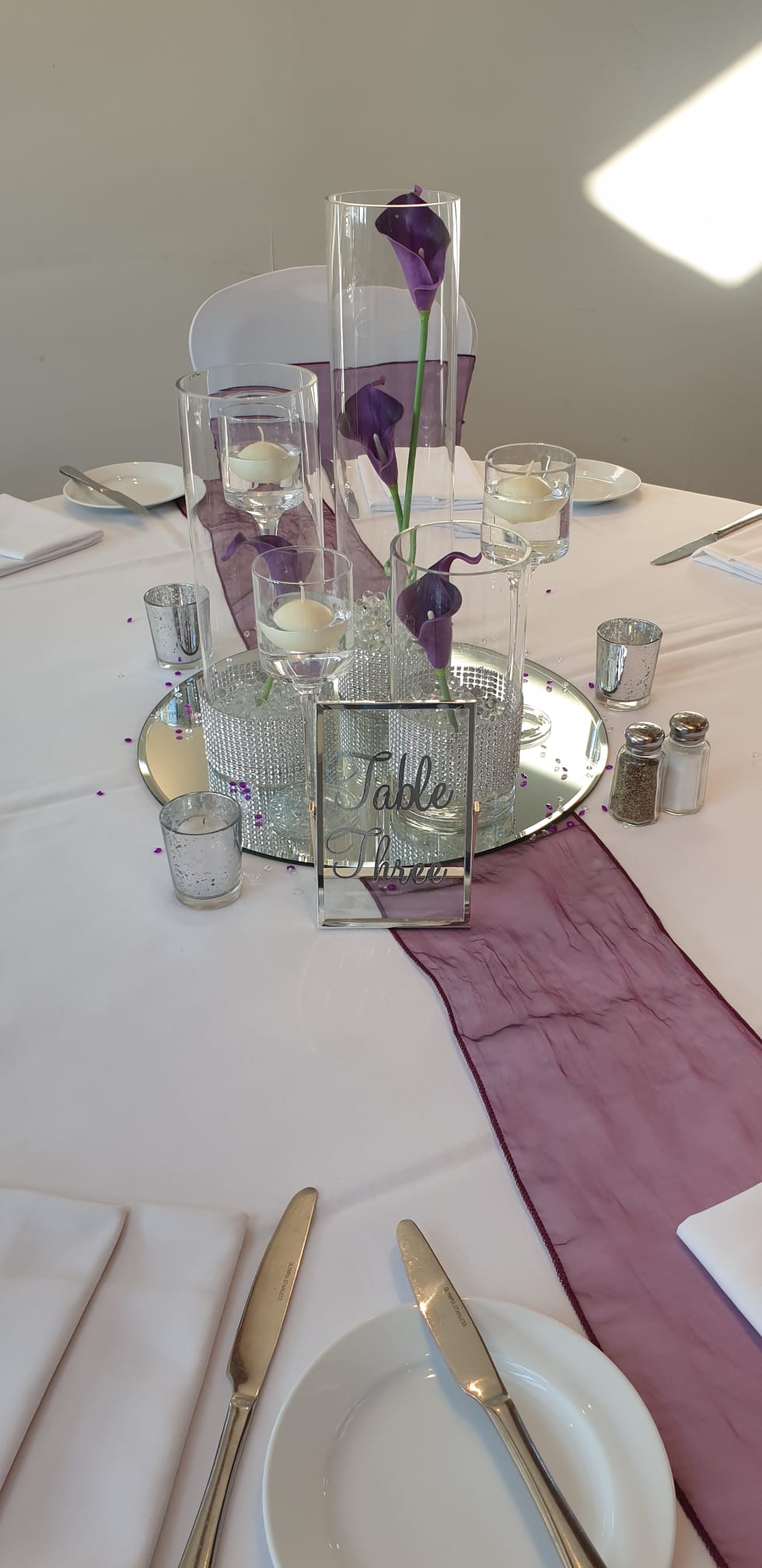 With Artificial Purple Calla Lily Trio